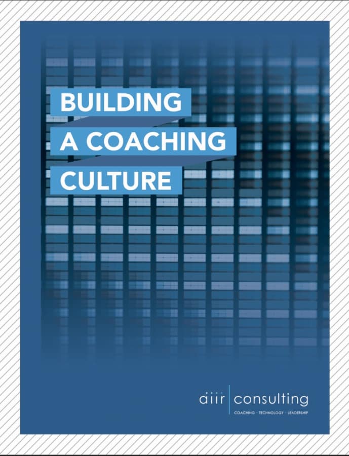 a blue cover of a book about the coaching mindset called Building a Coaching Culture outlining the leader as coach mentality
